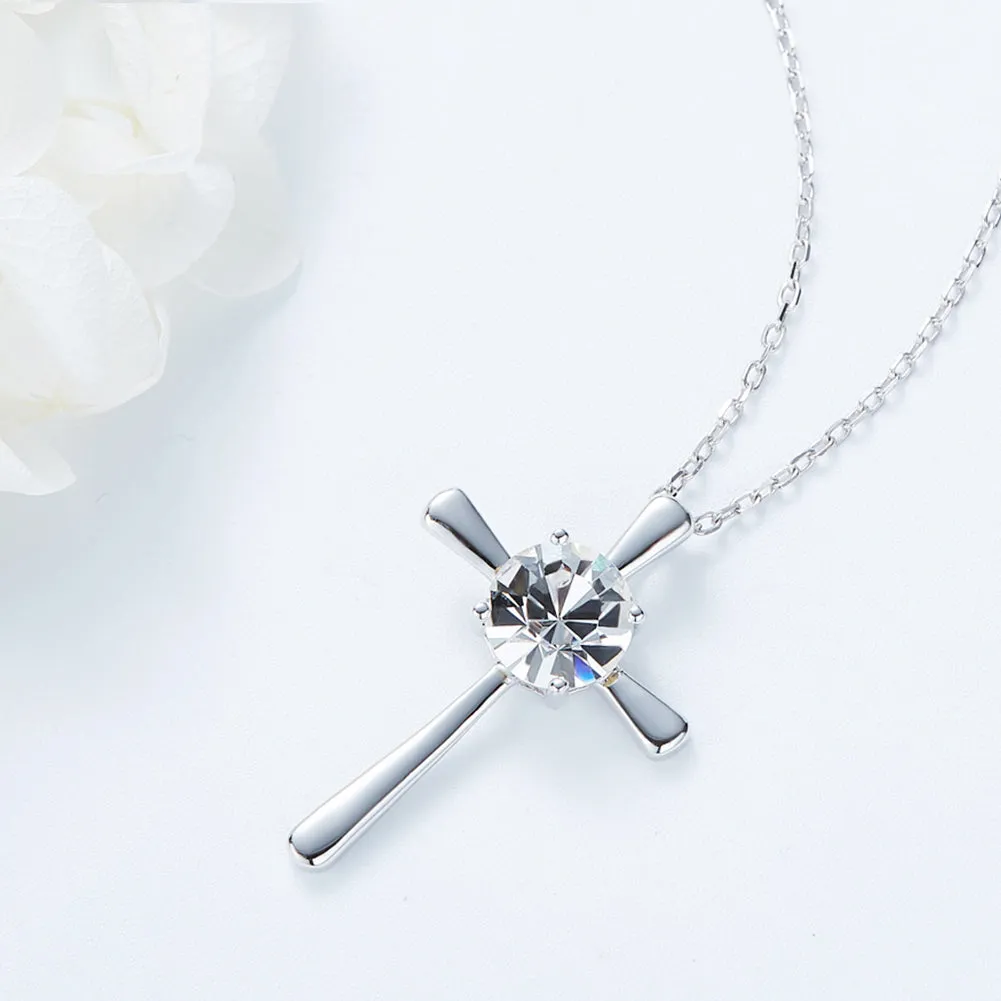 Sterling silver cross with a crystal heart necklace